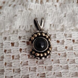 Sterling Silver Black Stone Pendant with Gold Accents